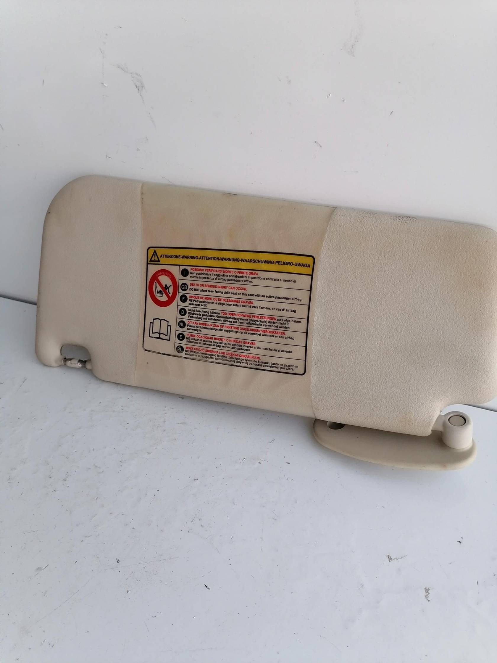 Aletta parasole parabrezza sx.